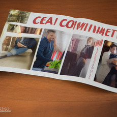 A book or magazine cover with a photo of a woman and a man and text reading "CEAI COMUNIMENTO".